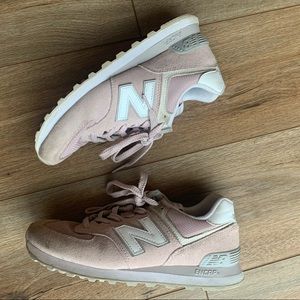 Slightly worn pink new balance sneakers